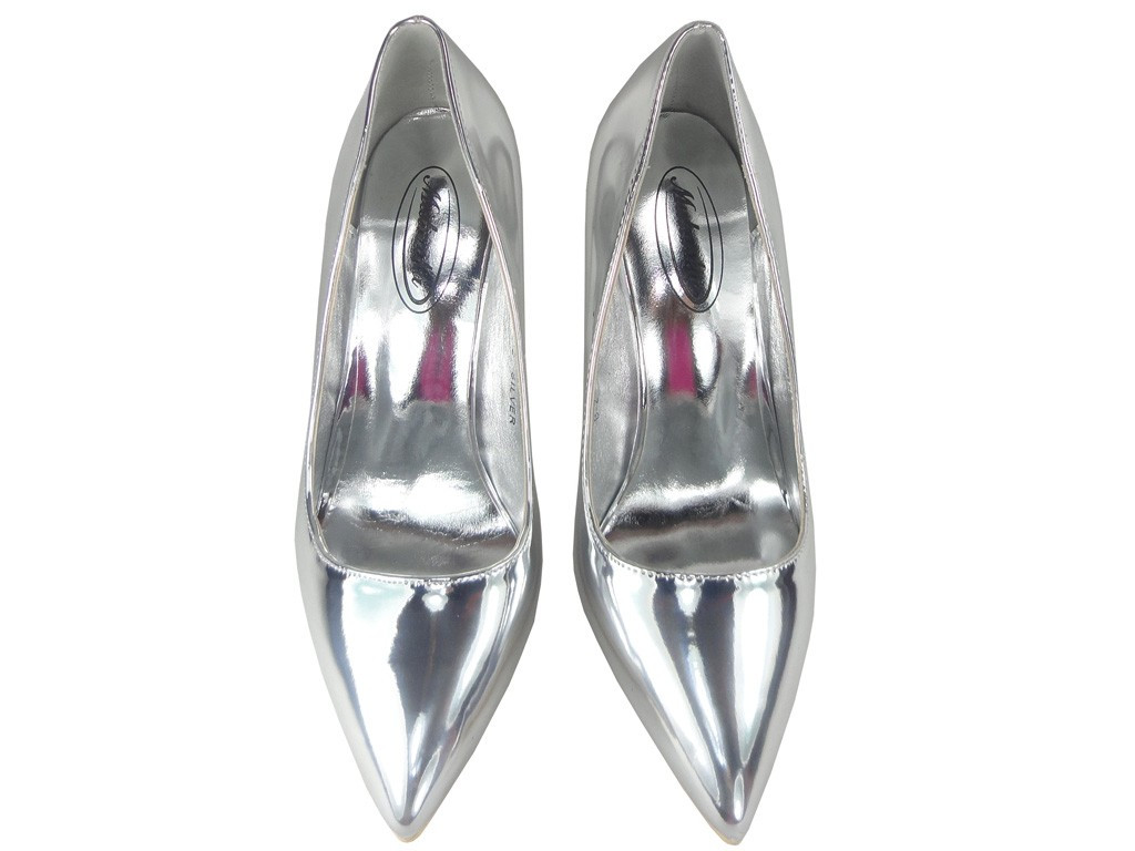 Silver pins mirroring the shuttlecraft - 2