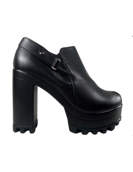 Tall black boots on a platform block - 1