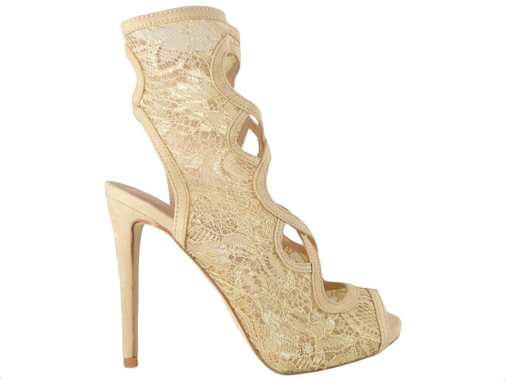 Fleshy sandals for openwork pins at the ankle. - 1