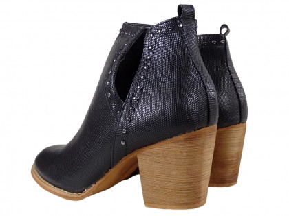 Black women's boots on a block like cowgirls - 2