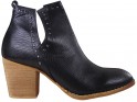 Black women's boots on a block like cowgirls - 1