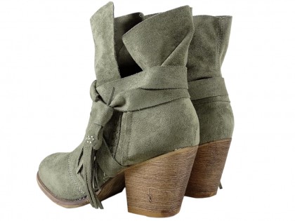 Green suede women's boots on a pole - 2