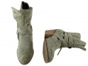 Green suede women's boots on a pole - 3