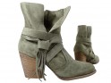 Green suede women's boots on a pole - 4