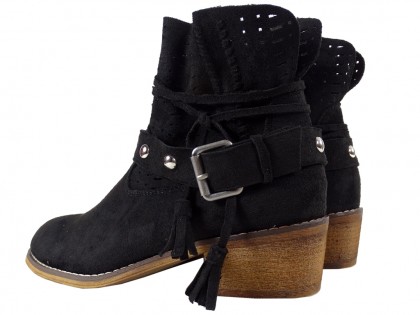 Black women's suede boots on a brick - 2