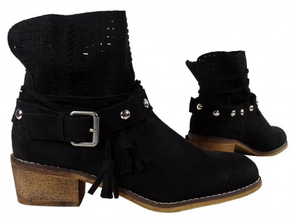 Black women's suede boots on a brick - 4
