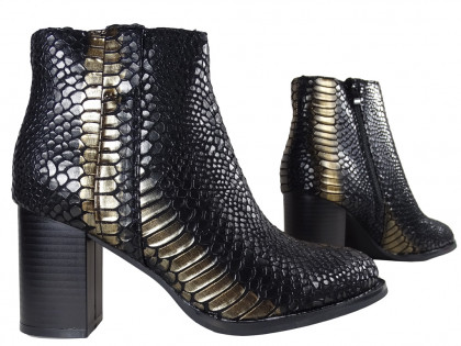 Black-golden scaly women's boots on a pole - 3