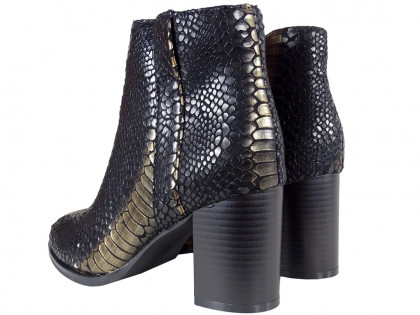Black-golden scaly women's boots on a pole - 2