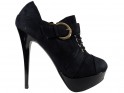 Black suede boots on a tied platform - 1