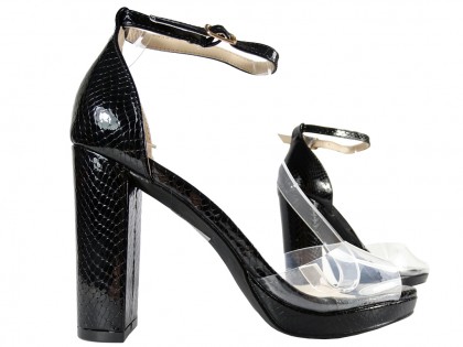Black women's ankle strap sandals on a bar - 3