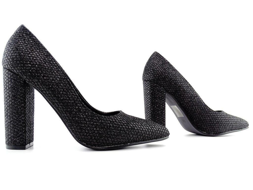 Black pumps on a post - 3