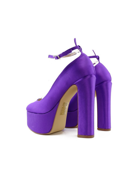 Purple platform pumps on a post - 2