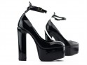 Black platform shoes on a post with a strap - 4