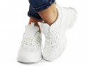 Białe sportowe buty damskie na wysokiej podeszwie