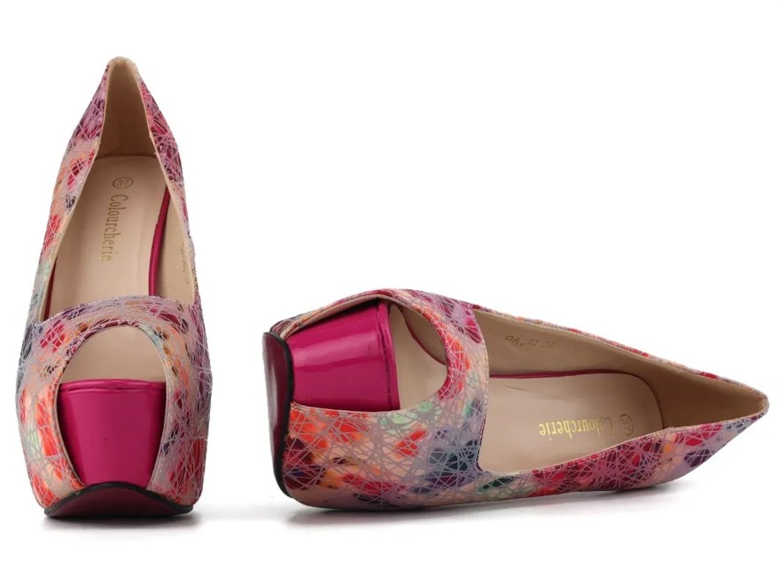 Pink platform heels with a trendy pattern