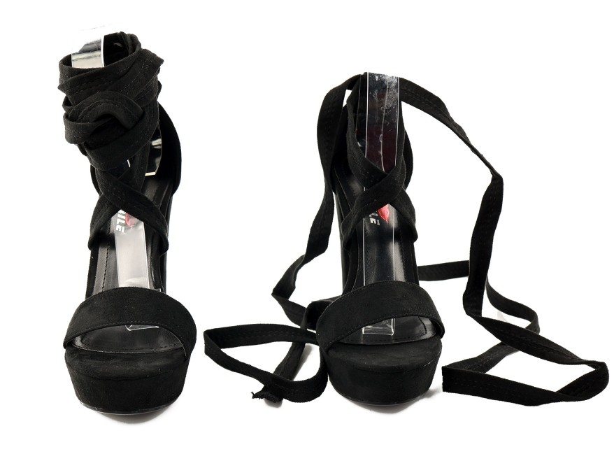 Black platform gladiator sandals with straps